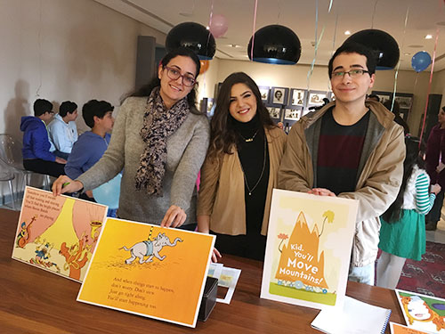 The writing center diwaniya volunteer at dar al athar al islamiyyas dai story time for children at the amricani cultural centre