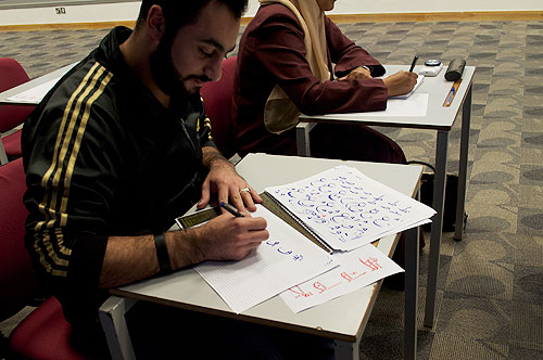 Auk arabic literature club organizes calligraphy workshop by jassim al-nasrallah