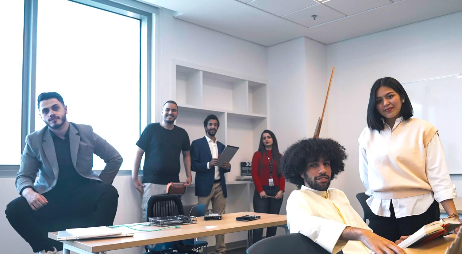 AUK students engaged in a dynamic classroom discussion, fostering academic growth