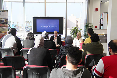 Auk library holds a poetry reading and book signing for yousef nayef