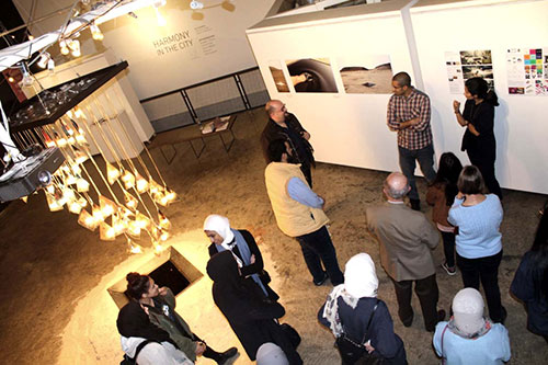 President Tim Sullivan and AUK Students Visit Masaha 13: Harmony in the City Exhibition