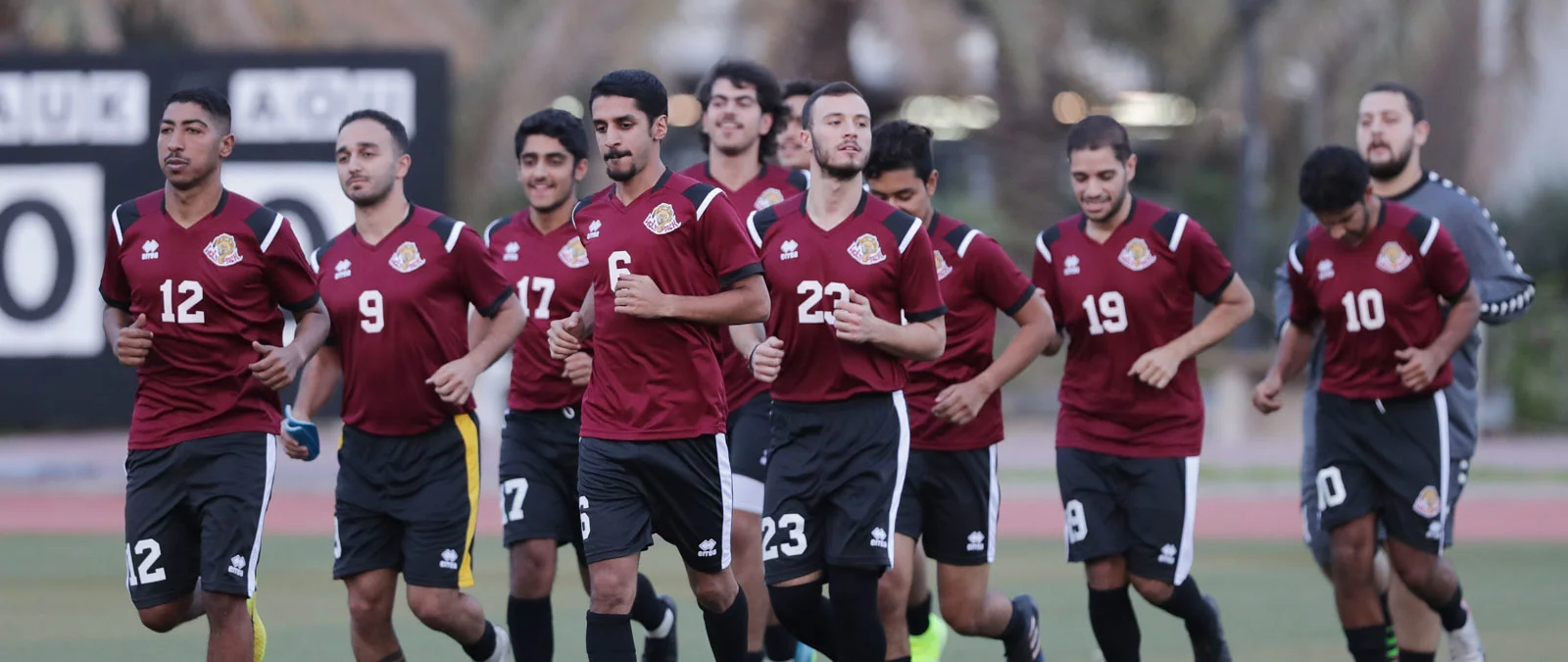 AUK university players warming up before a match.