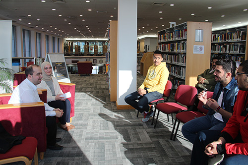 Auk library holds a poetry reading and book signing for yousef nayef